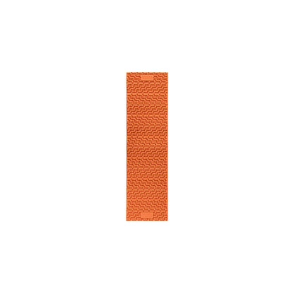 Front view of the Sunset Orange NEMO Switchback full-length foam sleeping pad showcasing its unique interlocking hexagonal node pattern and accordion folding design.