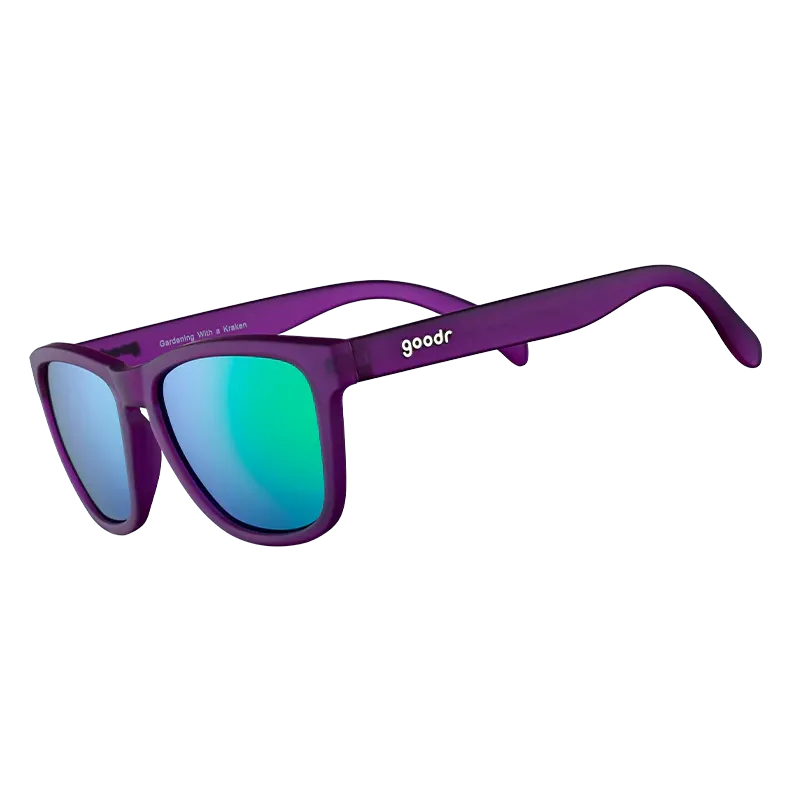 Goodr Purple sunglasses with blue-tinted lenses on a white background