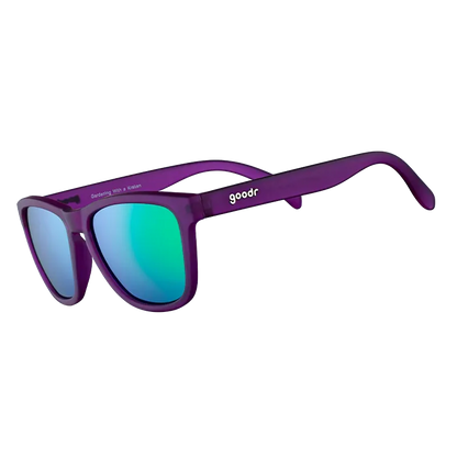 Goodr Purple sunglasses with blue-tinted lenses on a white background
