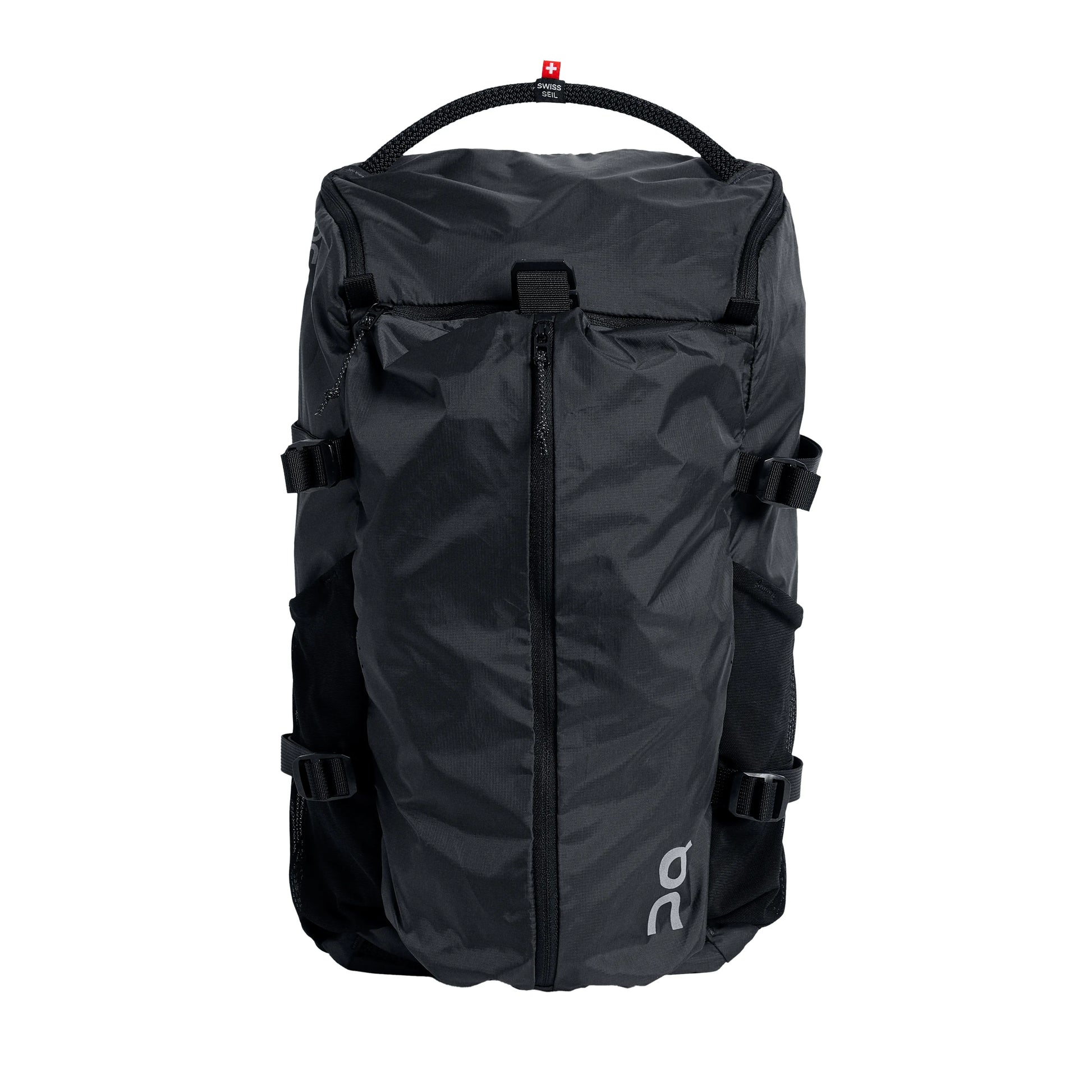 The black On Speed Pack 18L Lite backpack displaying its expandable front pocket, Swiss Seil handles, and side mesh bottle pockets.