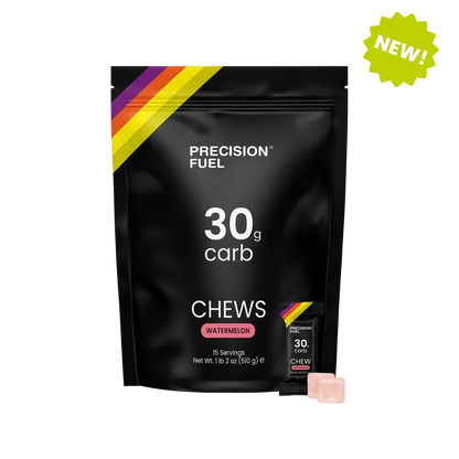 Precision Fuel 15 pack of 30g carb chews packaging with a small chew visible on a white background