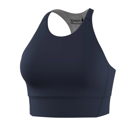 Front angled view of the Deep Navy Smartwool Women's Active Crop Bra showing its extended crop waist profile, secure high neckline, and clean straps.