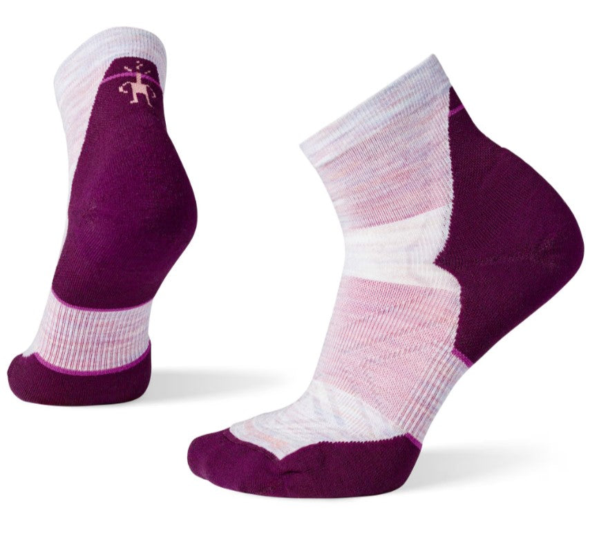 Pair of purple and pink Smartwool socks on a white background